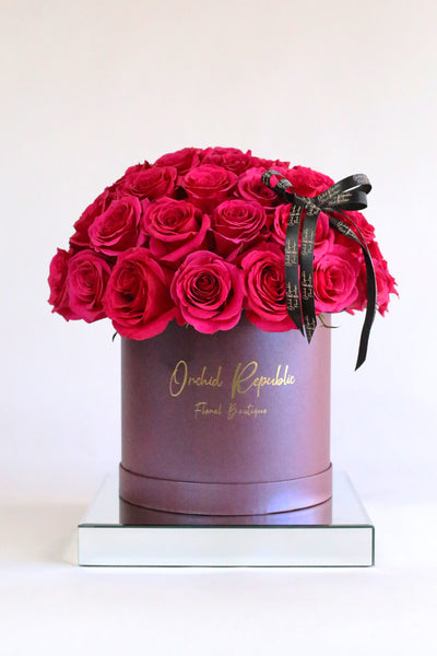 Romantic, dramatic flower arrangements - lots of roses in Eiffel