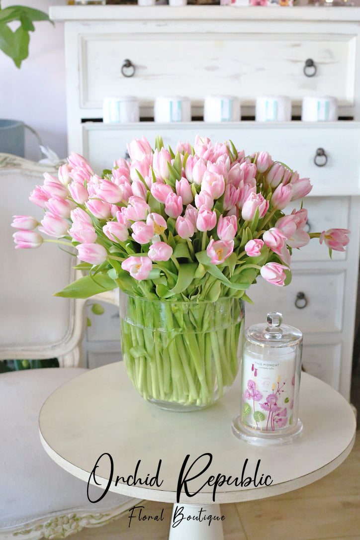 Pink And White Tulips In A Vase